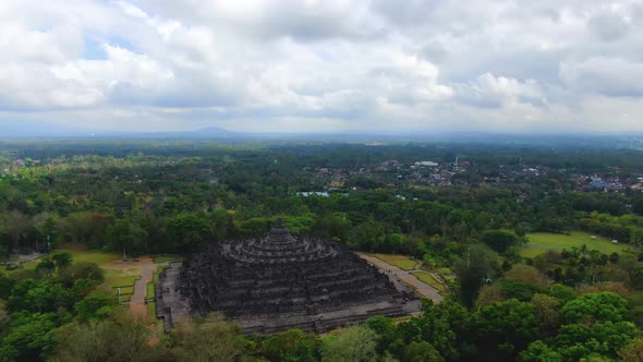 Historic structure of Borobudur temple, aerial flying over view