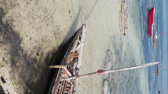 Vertical Video of Low Tide in the Ocean Near the Coast of Zanzibar Tanzania Aerial View