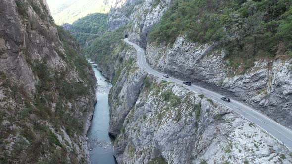 Aerial view of Tara river canyon, big mountains and road Montenegro, Europe