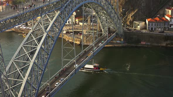 Dom Luis Bridge and Boat on Douro River in Porto