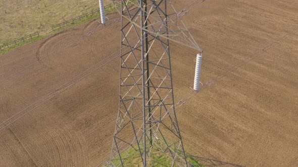 High Voltage Electrical Transmission Pylon Close Up Aerial View