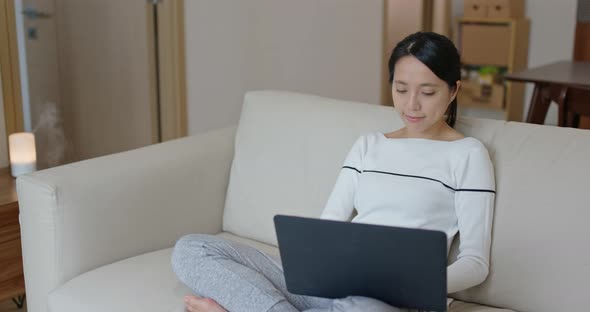 Woman work on computer at home