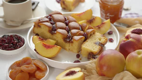 Delicious Homemade Peach or Nectarine Cake Fresh Fruits Marmalade Cranberry on Stone Background