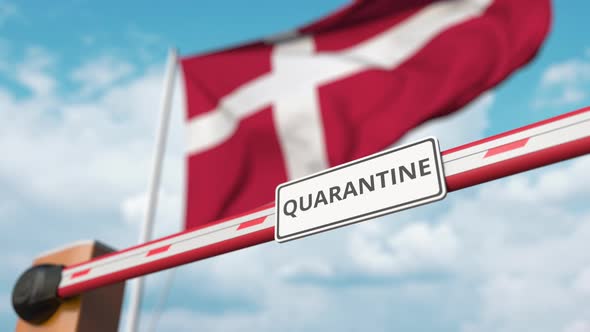 Open Boom Gate with QUARANTINE Sign Near the Danish Flag alt
