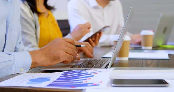 Executives Working on Table in Office 4k