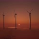 3D animation of offshore wind turbines at sunset. Wind Farm, renewable energy. - VideoHive Item for Sale