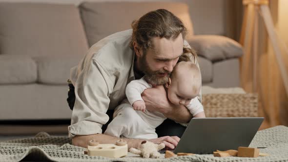 Single Father Bearded Man Dad with Little Girl Daughter Son Child Baby Kid Infant Newborn Sits at