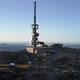 Ulriken tower over Bergen, Norway with a revealing shot of the city - VideoHive Item for Sale