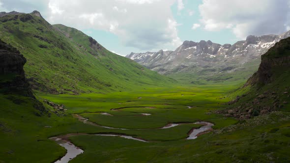 Curved river in mountainous valley