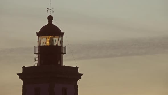 Lighthouse Lighting in the Twilight at Sunset