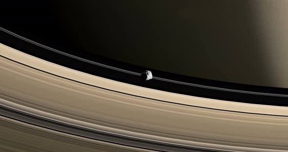 Epimetheus Around the Saturn Rings alt