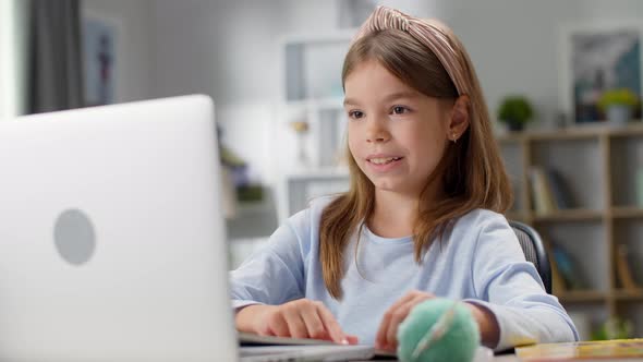 Online Lesson at Home in the Living Room Communication with the Teacher By Video Call