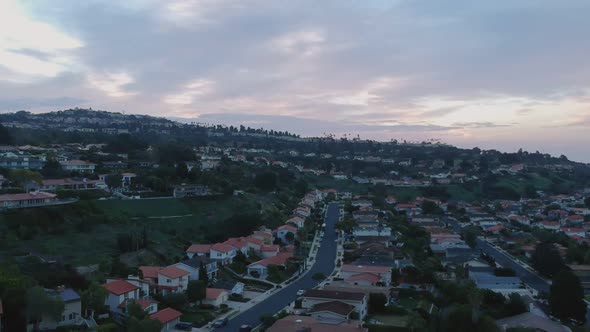 Early morning drone view from a bit lower height and landing slowly above the Palos Verdes Estates,