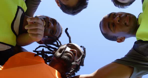 Soccer Players Forming a Huddle 4k