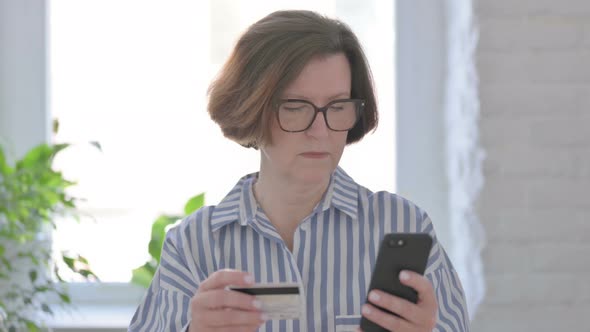 Senior Woman Shopping Online on Smartphone