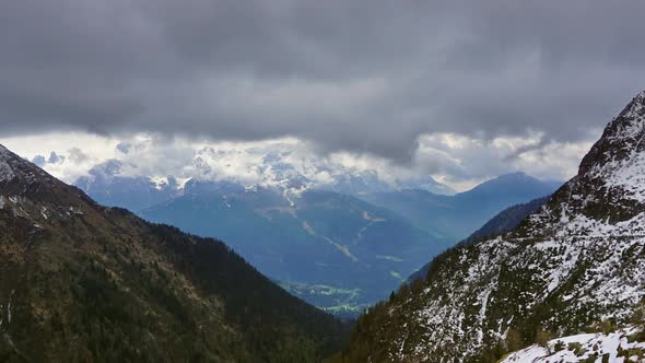 Snow Mountains in Clouds Landscape in Alps