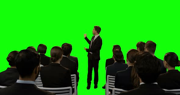 Businessman giving presentation on futuristic digital screen