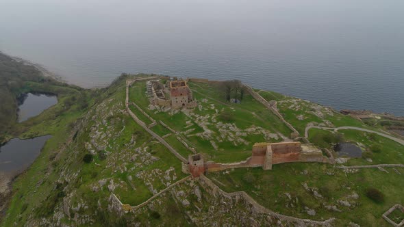 Aerial footage of the medieval castle ruin of Hammershus in Denmark, drone stock footage