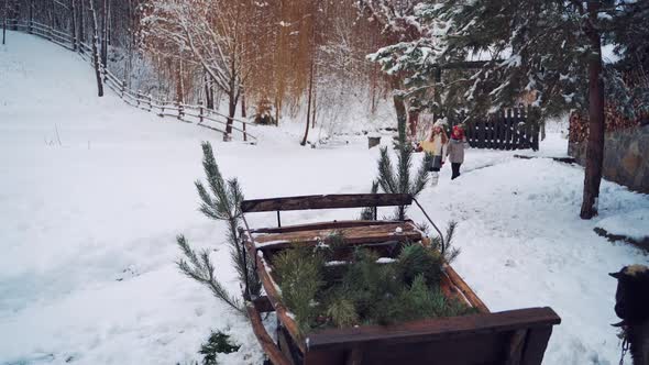 Happy children with envelope in winter in the yard.