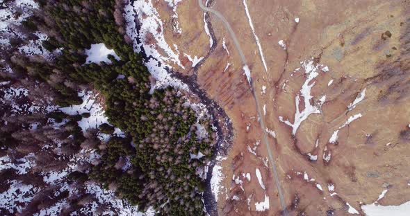 Aerial Flight Overhead Over Creek in Yellow Mountain Valley and Forest Fall Establisher