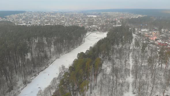 Winter Forest River And Village