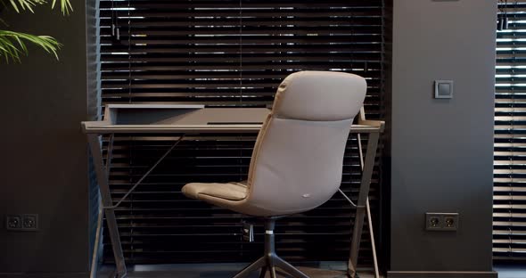 Modern Wooden Work Table with Minimalist Leather Chair on Comfortable Work Room