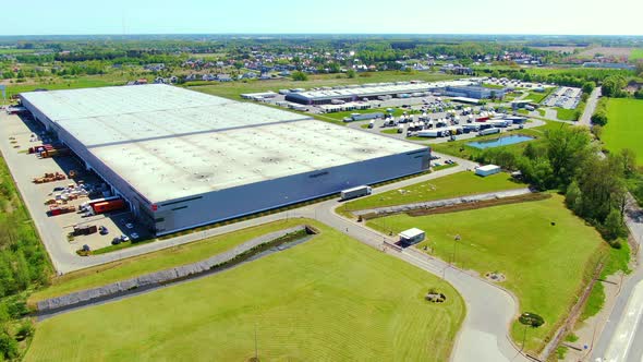 Aerial view of warehouse storages or industrial factory or logistics center from above. Top view of