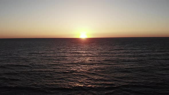 Red Sun with Sun Road Setting Over Sea in Cyprus, Paphos