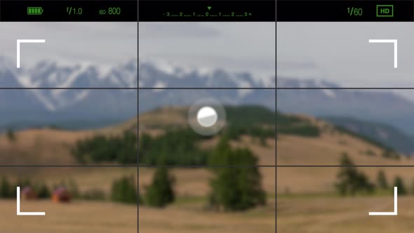 A look through the photo camera at Kurai steppe and snow mountains