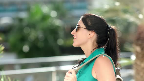 Happy Travel Female with Backpack Admiring Nature at Sunny Day Having Positive Emotion Closeup