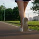 Young Fitness Sport Woman Running on Road at Sunset - VideoHive Item for Sale