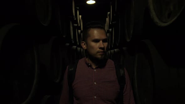 Old Wine Barrels in a Wine Cellar Sommelier Man Tourist Dicover Porto Portugal Old Factory Stock