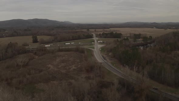 Ascending drone shot of a main highway.