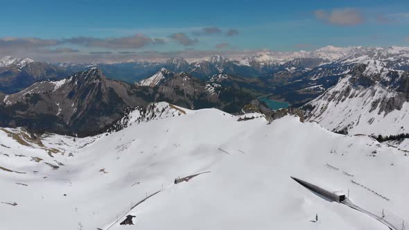 Aerial Drone View on Snowy Peaks of Swiss Alps. Switzerland. Rochers-de-Naye Mountain Peak