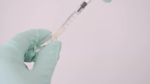 Doctor Holds COVID 19 Coronavirus Vaccine in His Hand