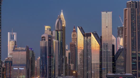 Aerial View of New Skyscrapers and Tall Buildings in Dubai Day to Night Timelapse