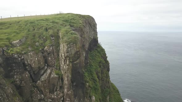 Green Cliffs of Faroe Islands in Cloudy Weather