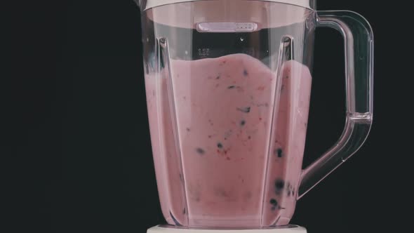 Blender Turns Berries and Milk Into a Slow Mo Milkshake