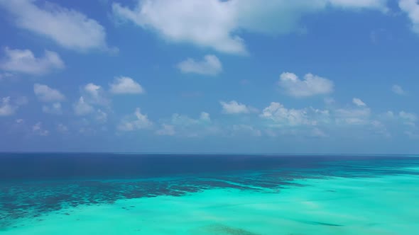 Aerial drone landscape of luxury sea view beach trip by transparent ocean and white sandy background