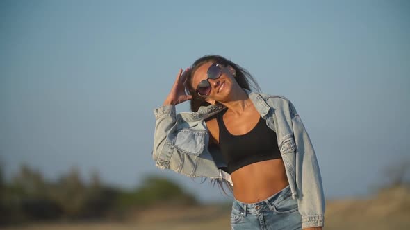 Girl with Long Hair in Jeans