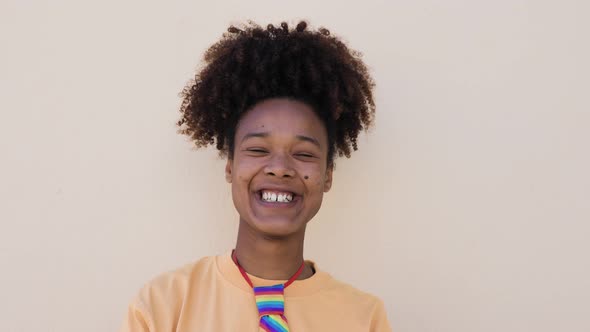 Happy Afro gay woman celebrating pride - LGBT concept