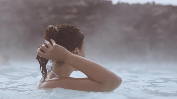 Woman Relaxing In Lagoon Geothermal Spa