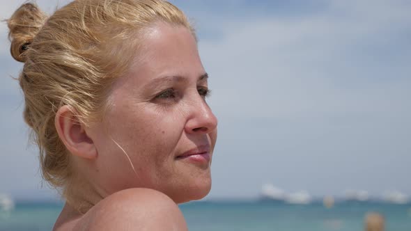 Blond Caucasian female enjoys on French coast 3840X2160 UHD video - Beautiful woman on the beach 216