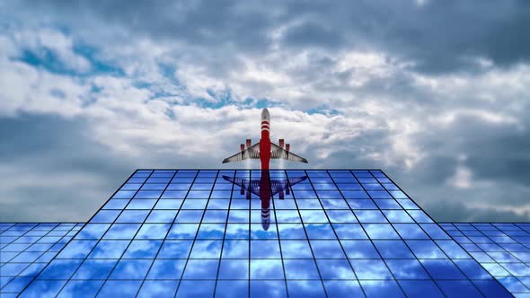 Airplane Flies Over Modern Glass Building