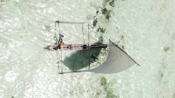 Vertical Video Boats in the Ocean Near the Coast of Zanzibar Tanzania Aerial View