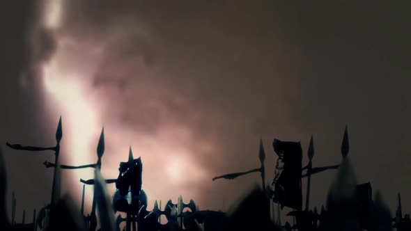 Big  Army of Medieval Warriors Marching To War Under A Lightning Storm