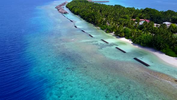 Drone view travel of sea view beach wildlife by blue water with sand background