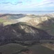 Aerial view over Italian hills with mist and clouds - VideoHive Item for Sale