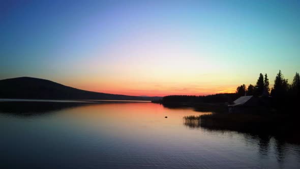 Aerial Video of Beautiful Mountain Lake on a Frosty Autumn Morning.