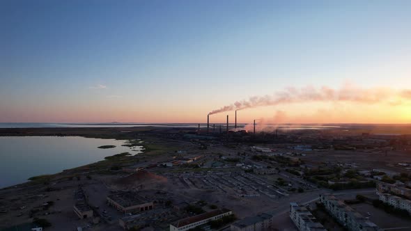 An Epic Sunset with a View of the Smoke of Factory